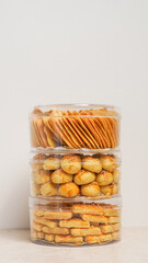 Stacked Clear Containers with Assorted Baked Goods: Cookies, Crackers, and Biscuits for Snacks