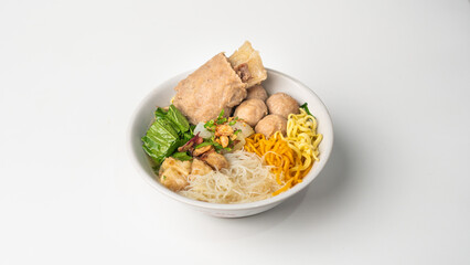 Indonesian Bakso: Savory Meatball and Noodle Soup with Fresh Toppings, Isolated on White Background