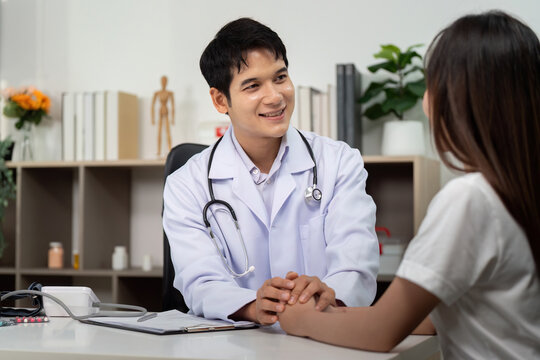 Healthcare Consultation. Doctor providing compassionate care to patient in a medical office.
