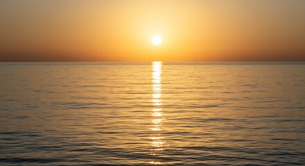Golden Sunset Reflecting on Calm Ocean Water with Bright Sun and Horizon