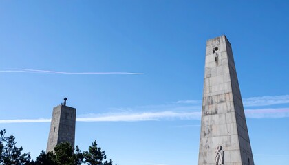 Simple Monas artwork with tricolor streaks set against a bright blue sky
