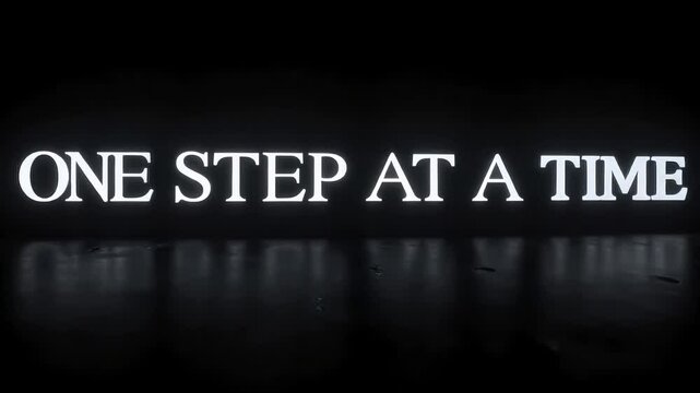 4K One Step at a Time Motivational Message Glowing in the Dark with Reflection