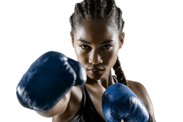 Powerful female boxer throwing a punch.