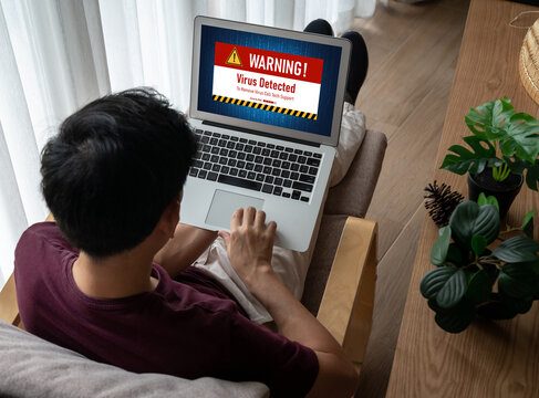 Virus warning alert on computer screen detected modish cyber threat , hacker, computer virus and malware