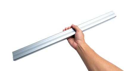 A hand firmly holding a straight metal ruler against a white background. The ruler is made of shiny, silver metal and the hand holds it with a secure grip