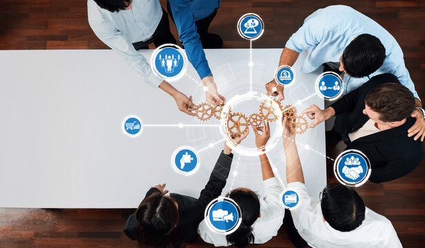 A dynamic and engaging business strategy session, showcasing professionals collaborating effectively to generate innovative solutions in a modern workspace, fostering teamwork and creativity. Amity