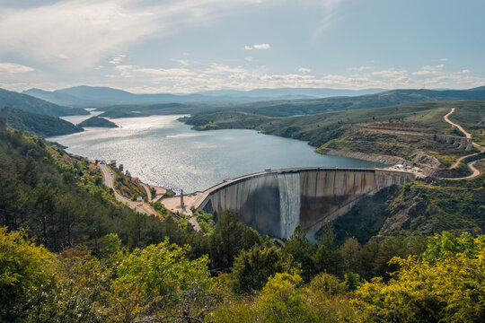 Dam releasing water in Atazar reservoir after rain