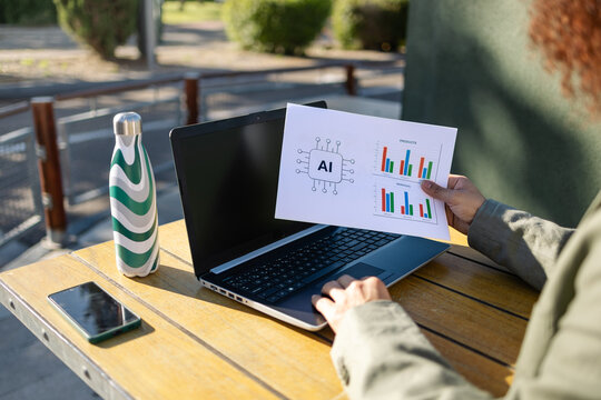 Woman working with data and technology outside