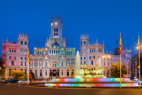 Cibeles fountain and palace lit for Pride in Madrid, Spain