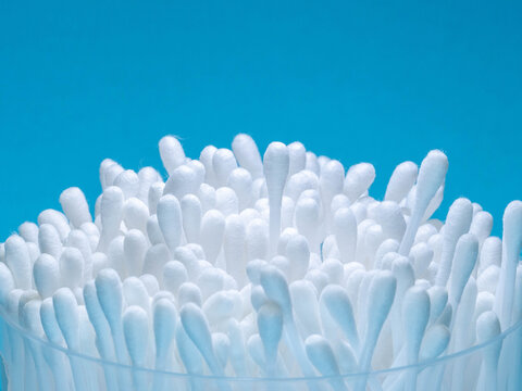 Close-up of cotton buds in a container