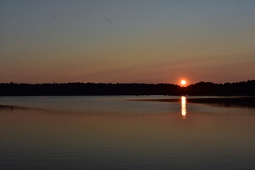 beautiful sunset reflecting off a lake