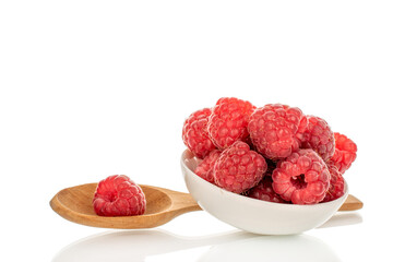 Fresh sweet raspberries isolated on white background, macro