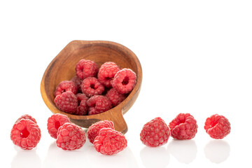 Fresh sweet raspberries isolated on white background, macro