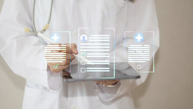 Healthcare, Medical service and Health insurance concept. Medicine doctor use tablet to review patient medical records on virtual screens for digital healthcare.