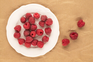 Sweet fresh raspberries, macro, top view.