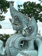 Close-up of Intricate Thai Naga Serpent Statue Heads Pa Khlong 11 Temple