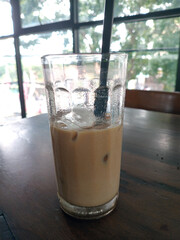Refreshing Iced Coffee in a Cozy Cafe Setting