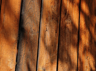 Diagonal wooden boards in slight shadow background