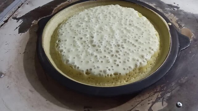 Close-up footage of cooking sweet martabak.