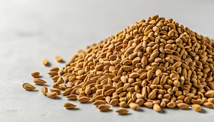 Obraz premium Pile of Fenugreek Seeds on Textured Background: Culinary Spice and Herbal Ingredient