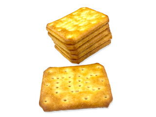 Stack of crispy golden brown biscuits isolated on the white background