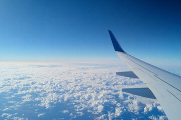 Obraz premium Clouds reflected on the smooth surface of an airplane fuselage