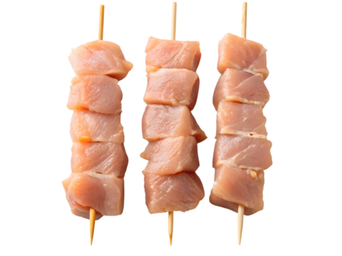 Three raw chicken skewers arranged vertically against a meat poultry