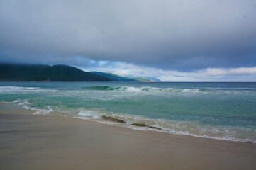 Peaceful Oceanfront Moments Beneath Heavy Evening Clouds, Sea of Japan Serenity