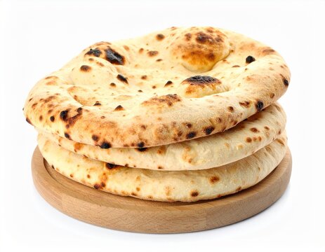 Stack of fluffy naan breads on wooden cutting board, isolated 