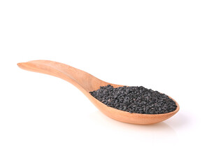 Black sesame seeds in wood spoon isolated on white background. top view