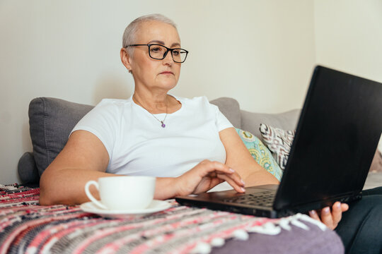 Senior woman regaining strength after cancer treatment - Powered by Adobe