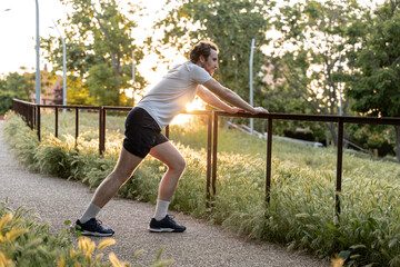 Adult person training outdoors at the end of the day