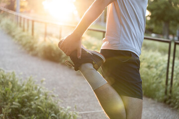Fitness training at sunset in the city
