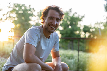 Man in sportswear smiling after physical training