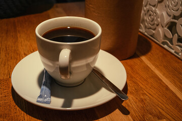cup on wooden table