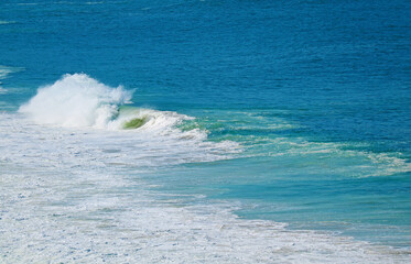 Impressive Aerial View of Powerful Waves Splashing on Vivid Turquoise Blue Ocean
