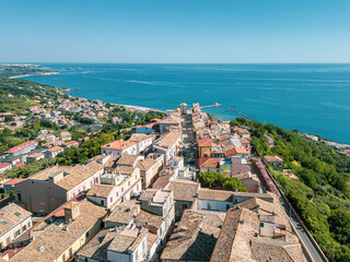 Italy, July 03, 2025: Aerial drone view of San Vito Chietino, a seaside resort on the Trabocchi coast. Here the sea is crystal clear and the area is very relaxing and full of tourists
