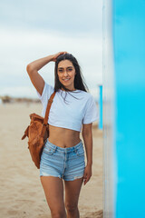 Young Woman Enjoying a Relaxing Day on the Beach