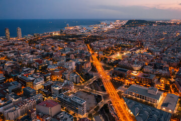 
Barcelona Urban Grid: Illuminated Streets and Residential Blocks at Dusk

An aerial view of...