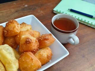 Bolang baling, Odading, fried bread in cubes or blocks, with a light brown crunchy outer skin and...