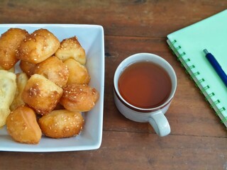 Bolang baling, Odading, fried bread in cubes or blocks, with a light brown crunchy outer skin and...