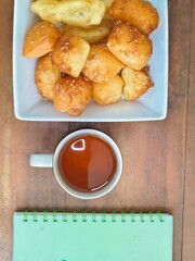 Bolang baling, Odading, fried bread in cubes or blocks, with a light brown crunchy outer skin and...