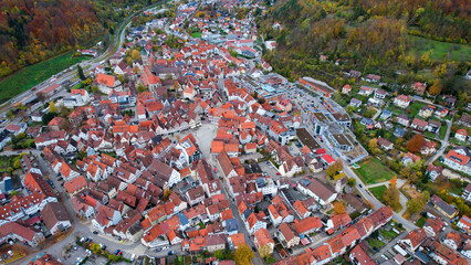 Aerial view of the old town of the city Bad Urach in Germany on a sunny afternoon in autumn
