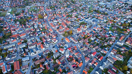 Fototapeta premium Aerial view of the old town of the city Laichingen in Germany on a sunny afternoon in autumn