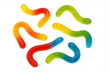 Colorful gummy worms spread across clear surface, showcasing bright candy shapes and playful candy texture