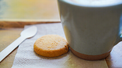 Biscuit and a cup of coffee in the morning