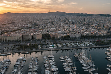 Barcelona Marina: Luxury Yachts and City Lights at Twilight

An aerial view of Barcelona's bustling...