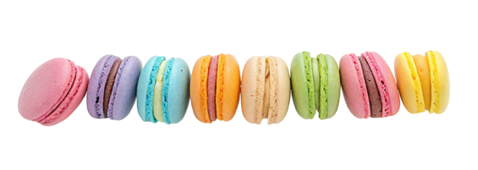 Colorful assorted macarons lined up in a row showcasing different flavors and vibrant pastel colors
