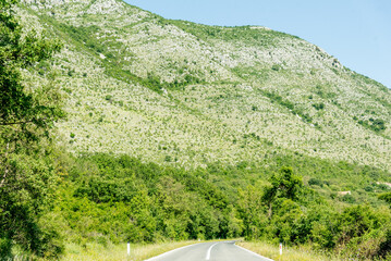 Scenic road among mountains Bosnia and Herzegovina, car drive along country road
