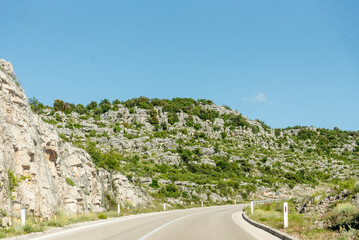 Scenic road among mountains Bosnia and Herzegovina, car drive along country road